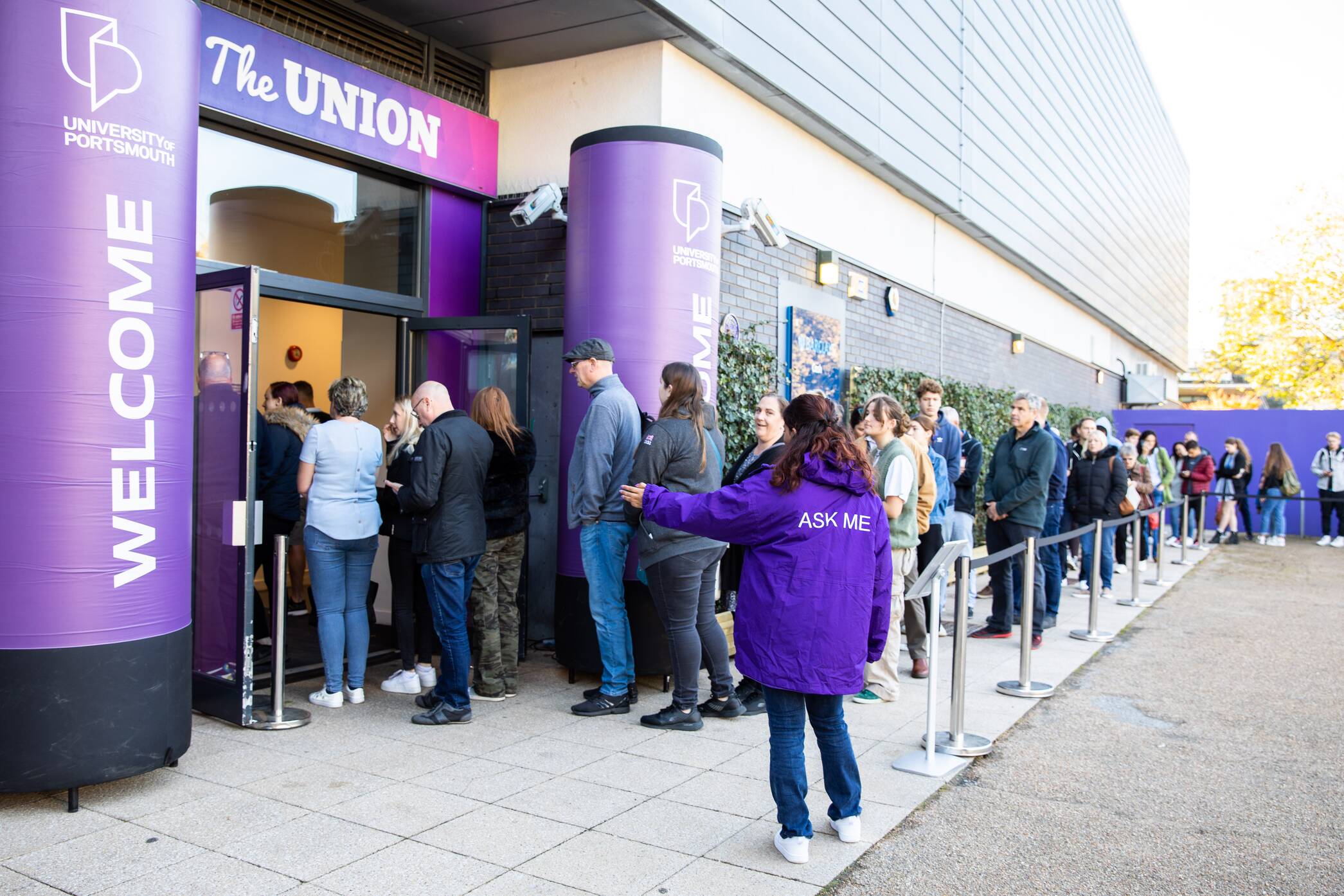 UoP Open day October 2024 Prospective students line up outside the Union building on an Open Day