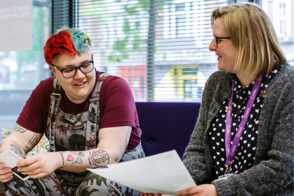 image of student in discussion with member of staff