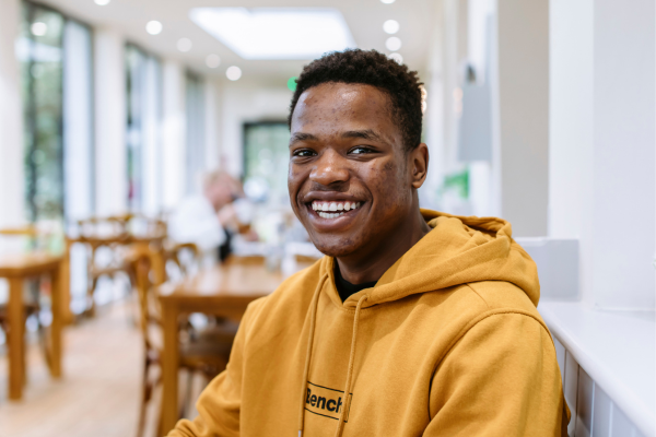 student smiling at camera