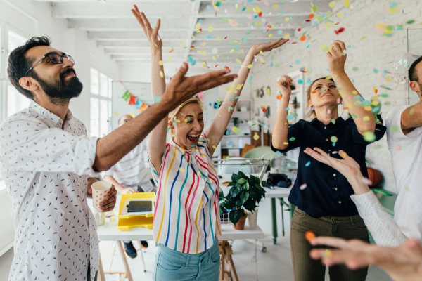 People celebrating in an office