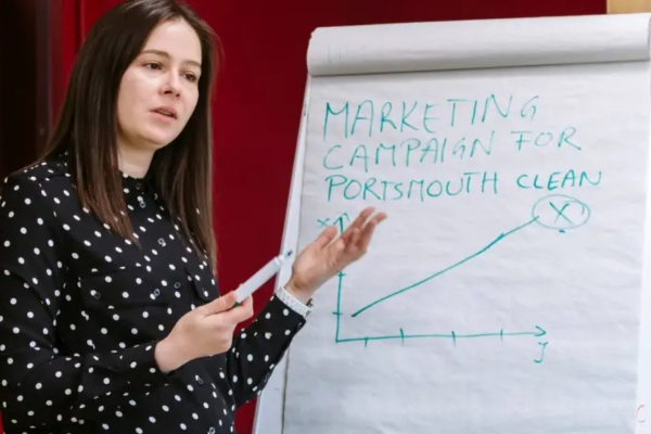 image of woman presenting with a flipchart