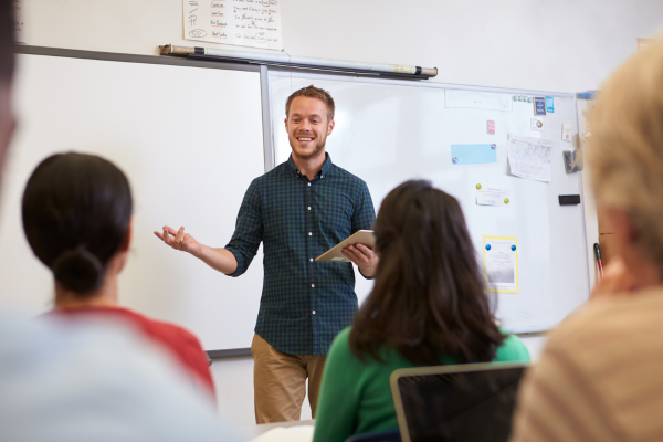 Image of man presenting to class